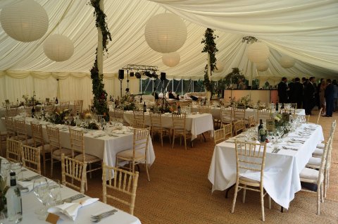 Wide trestles in a lined traditional Marquee - Spaceintense