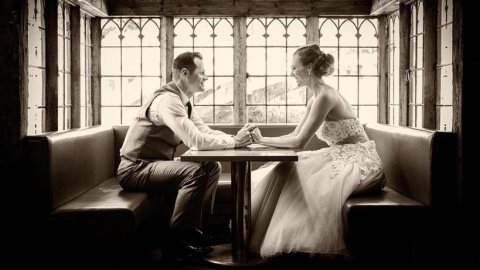 Bride and Groom in the bar - Le Talbooth