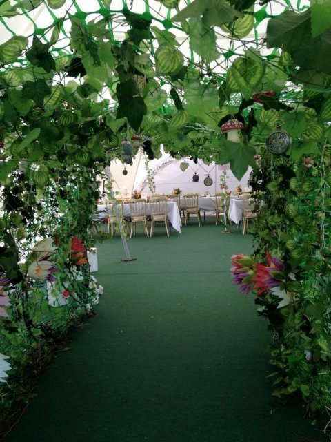 Rabbit hole entrance for mad hatters tea party wedding - Weddings by Charli
