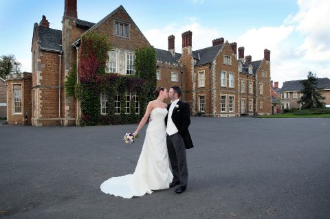 Bride and Groom outside Brooksby Hall - Brooksby Hall