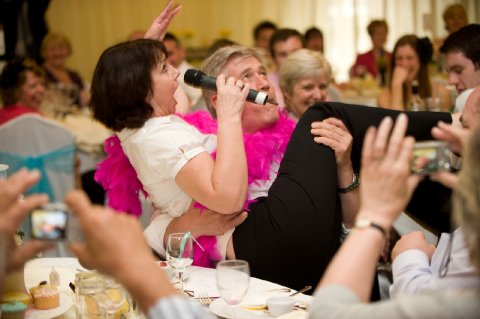 Getting Carried away in her work - Bravo Singing Waiters