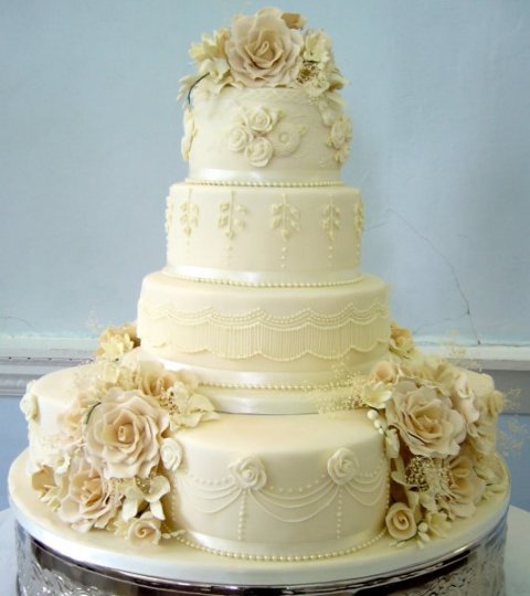 Dana - 7 tier wedding cake, 4 x 8 inch with a 10/8/6 cake on top - Wedding Cakes by Barbara