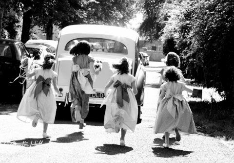 Bridesmaids chasing the departing bride & groom - Martin Hill Photography 