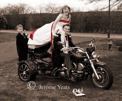 Bride laughs on trike motorcycle - JY Photography