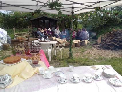 A party with tea and knitting round the fire pit - Our Farmhouse Kitchen