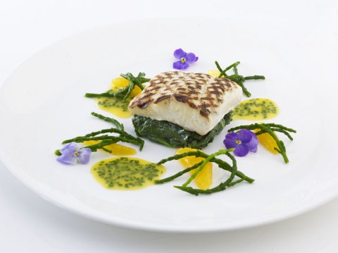 Griddled halibut with orange butter sauce, baby leeks and samphire - At home catering