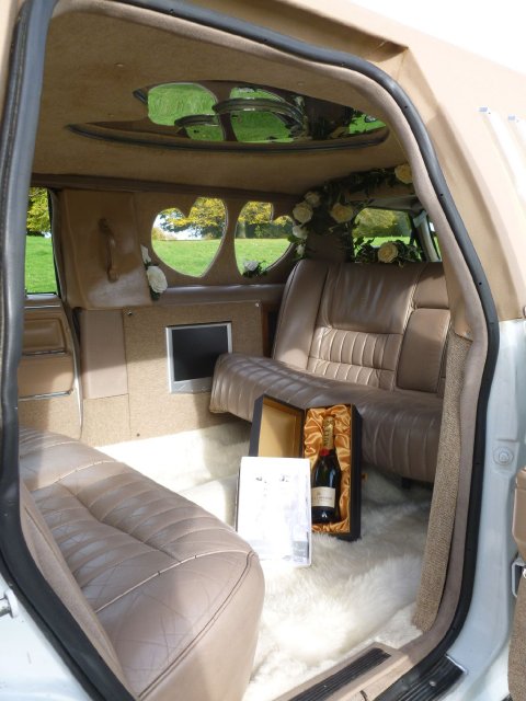 Excalibur interior seats 6 - Two Hearts Wedding Cars