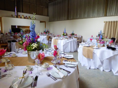 The Grainstore dining area with seating for up to 150 - Houchins Wedding Venue