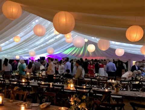Paper lanterns and fairy lights in a marquee - Maidman's Marquees