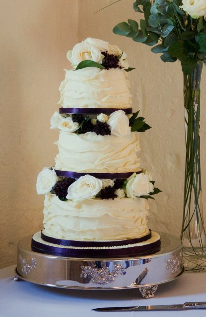 White chocolate ruffle Wedding cake with fresh floweres - Elizabeth Ann's Confectionery