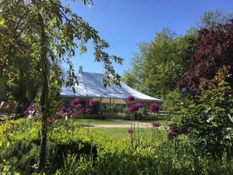 The marquee nestled in the landscaped grounds - Houchins Wedding Venue