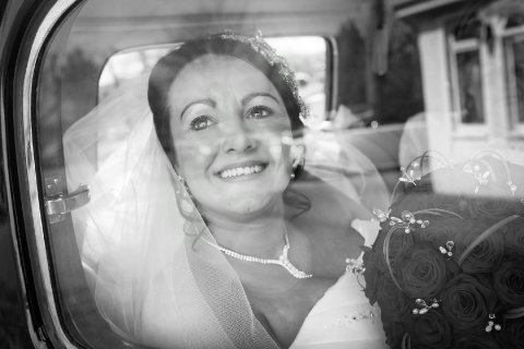 Happy Bride arriving at venue - PB Photography