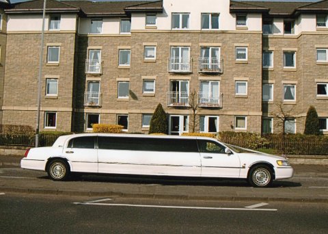 Stretch White Limousine - FIRST CLASS LIMOS PAISLEY