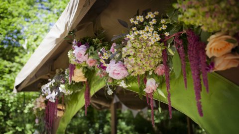 floral arch at the wedding pavilion - Cornish Tipi Weddings