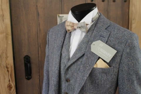 Blue three piece tweed suit with stylish accessories to complement the tweed colours - Chimney Formal Menswear