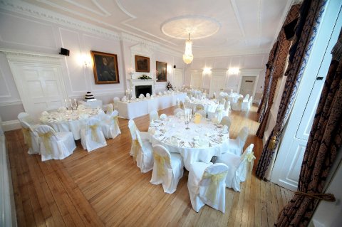 The Old Hall set up for a wedding breakfast - Brooksby Hall