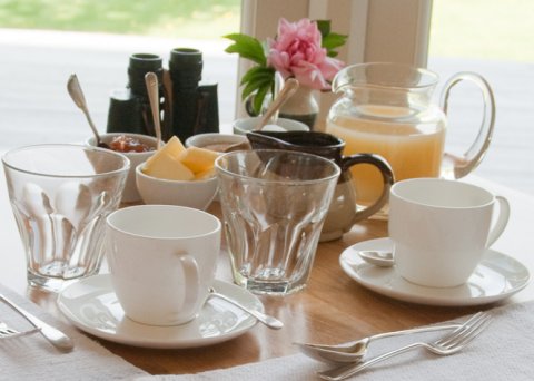 Table set for breakfast at Fairways Bed and Breakfast in Crewkerne in Somerset - Fairways Bed and Breakfast