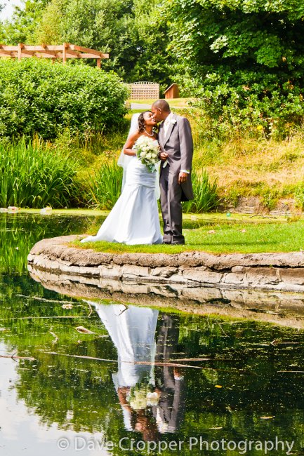 Bride & Groom/ reflection. - Dave Cropper Photography