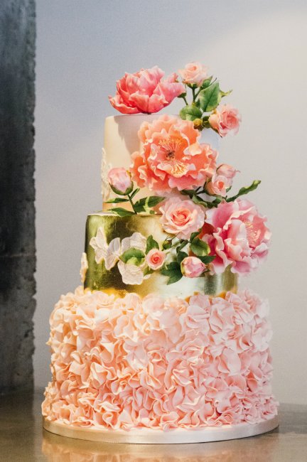 Gold leaf ruffled wedding cake with handcrafted sugar flowers - Little Bear Cakery