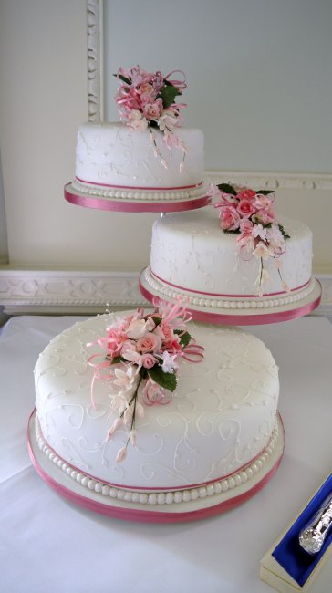 classic Pink wedding cake on cascading stand with sugar flowere - Elizabeth Ann's Confectionery