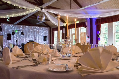 The Villers Halll set up for a wedding breakfast and evening reception - Brooksby Hall