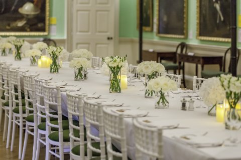 Dinner on a long table in the Picture Gallery - The Foundling Museum 