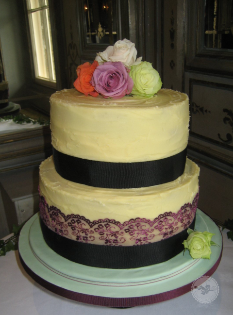 Butter cream icing with lace ribbon and fresh roses. - Sophisticakes 