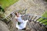 bride on outside stairs HR.jpg