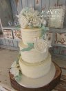 Three Tier Rustic Buttercream Wedding Cake with White and Ivory Sugar Flowers West Yorkshire Cake Maker2.jpg