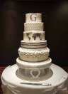 5-tier-white-flowers-stripes-world-wedding-cake.jpg